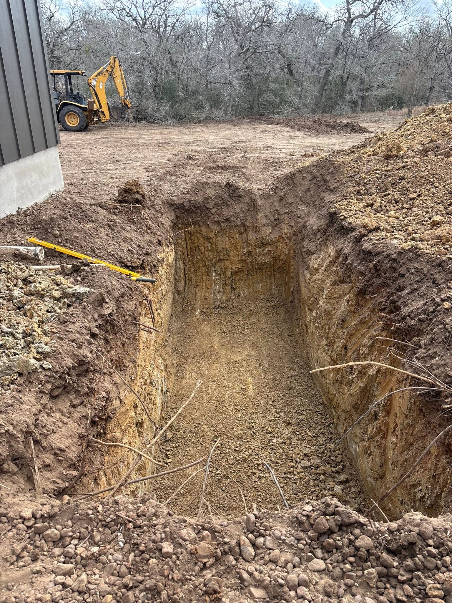 Deep trench work on a Pair of Dice Services job site