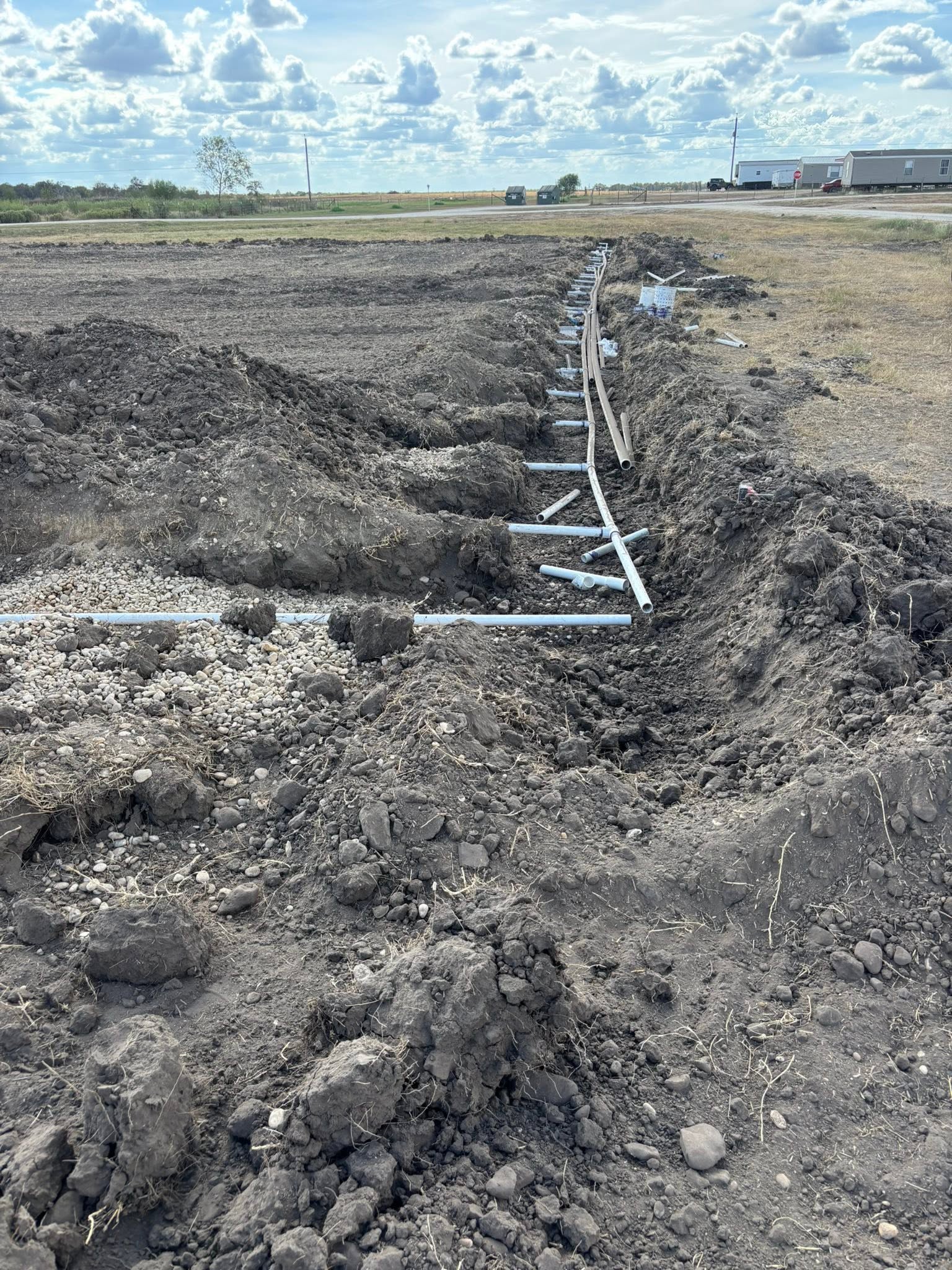 Branching trench and pipe layout